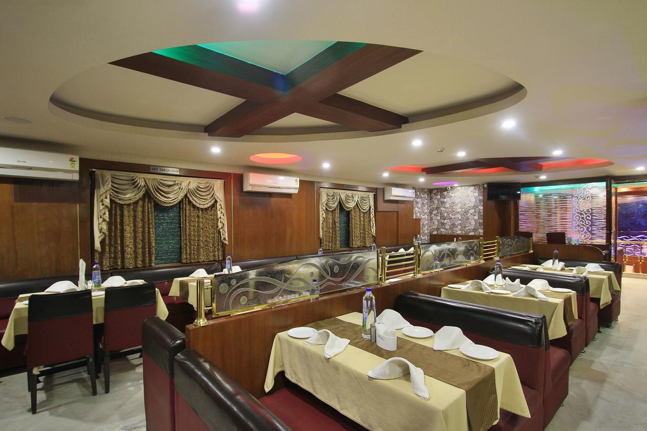Oyo 6110 Thalassa Suites Bangalore Buitenkant foto