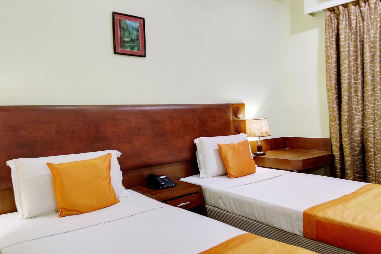 Oyo 6110 Thalassa Suites Bangalore Buitenkant foto