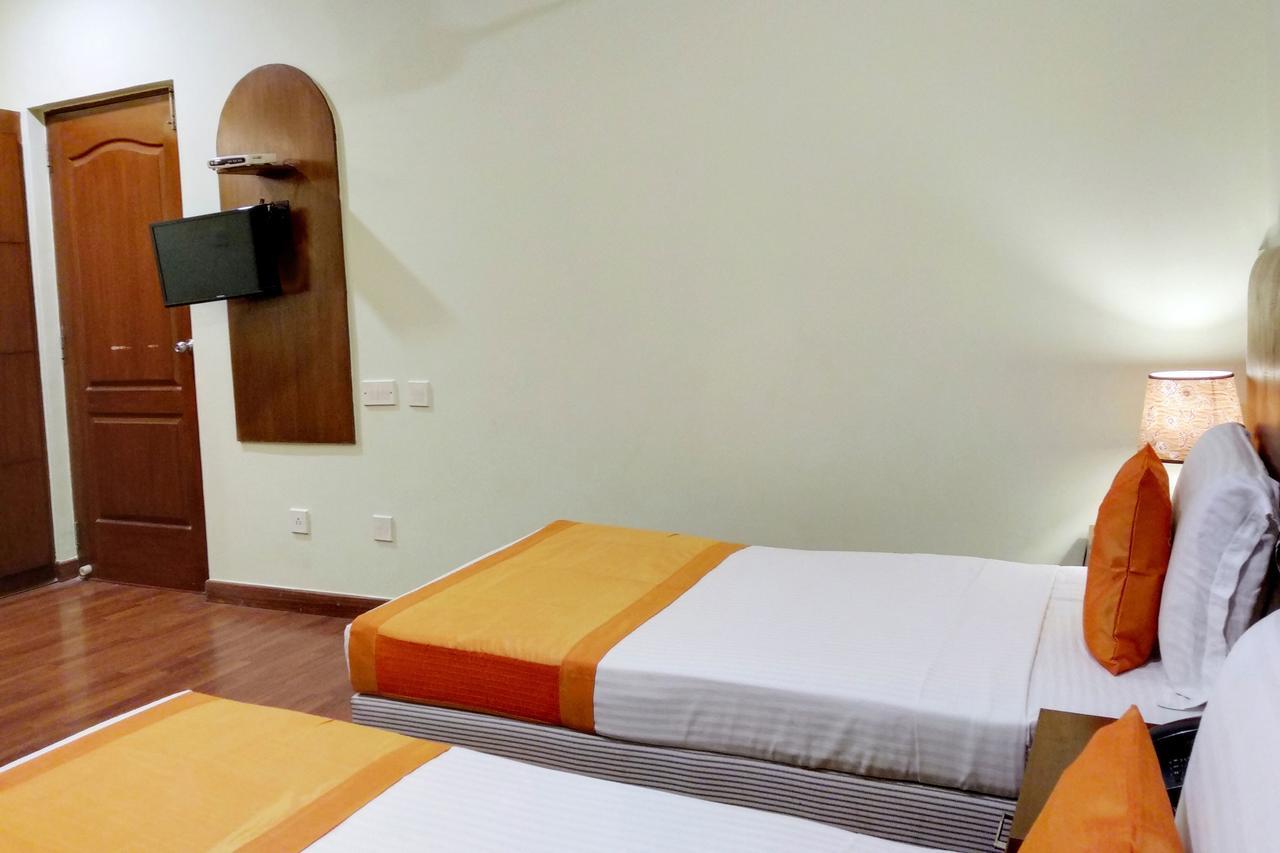 Oyo 6110 Thalassa Suites Bangalore Buitenkant foto